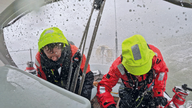 Two people on a yacht in a shower