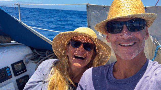 People smiling in sunhats