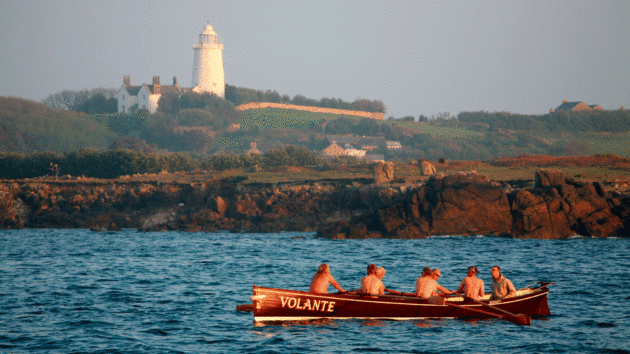 The Dartmouth crew passing the lighthouse at St Agnes in former times