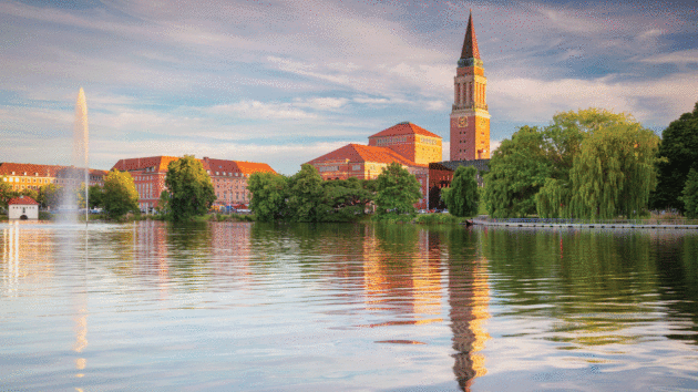 Kiel, Germany, with the town hall, and opera house shimmering in the sunset, marks the start of many sailors’ Baltic exploration