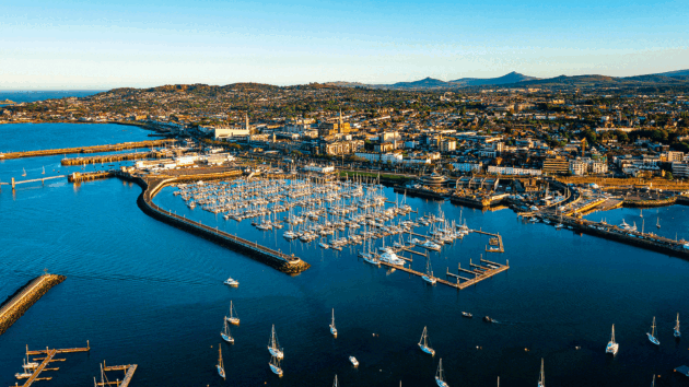 Aerial view of Dun Laoghaire Harbour and marina with the Wicklow mountains behind