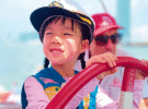 A child at the helm