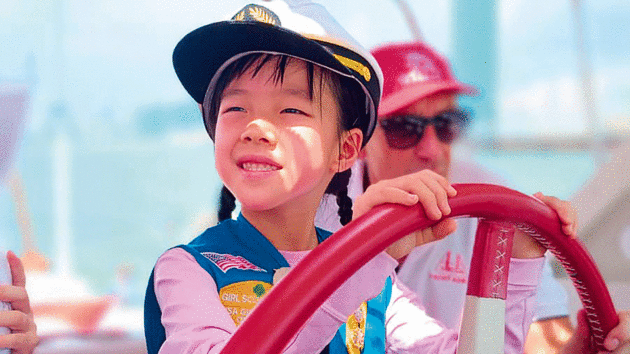 A child at the helm