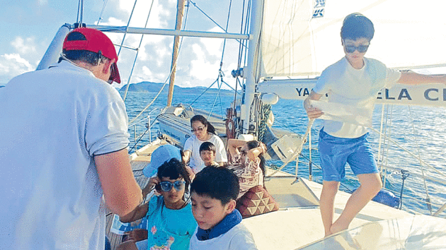 Children aboard a yacht