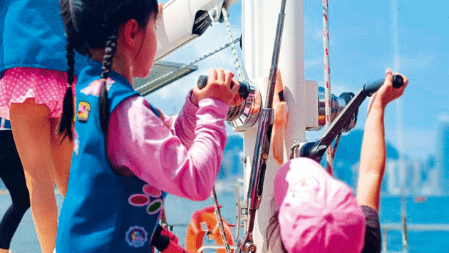 Children learning on a yacht
