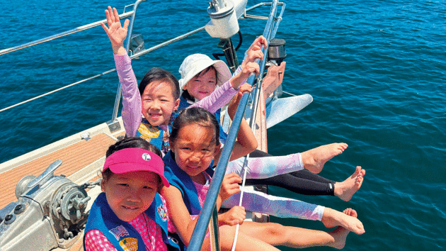 People on the yacht bow
