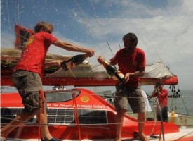 Francois Gabart and Kito de Pavant of Groupe Bel celebrate finishing 2nd place in the Transat Jacques Vabre