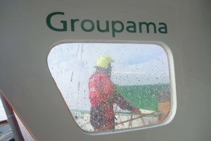 Groupama 3, crewman through window