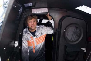 Alex Thomson in a reflective mood as he heads out to
the start of the Vendee Globe, aboard his yacht, Hugo Boss.
Jonathan Glynn-