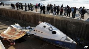 wreckage of boat hit by wave