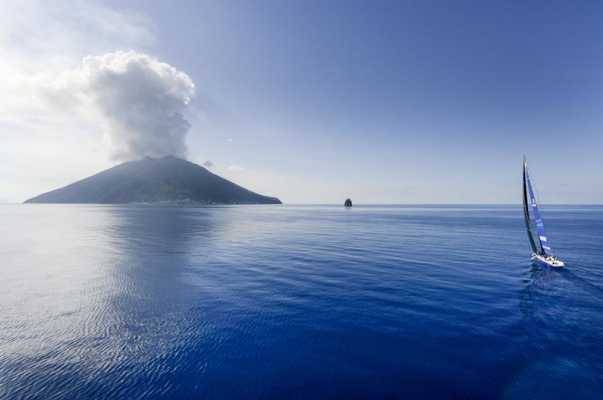 Esimet Europa 2 approaching Stromboli in the 2014 race. Image courtesy Kurt Arrigo