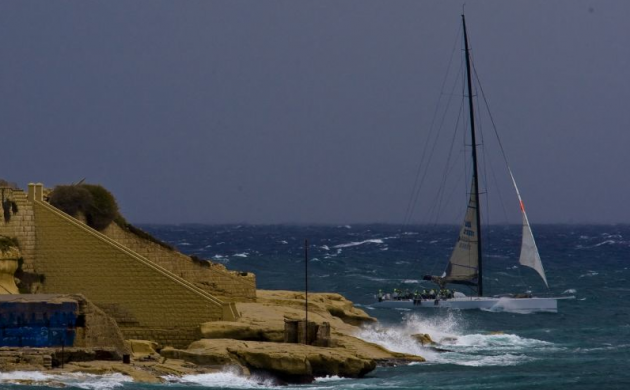 RAMBLER, CROSSING THE FINISH LINE AND BREAKING THE ROLEX MIDDLE SEA RACE RECORD