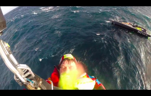 Alex Thomson winched up to a Spanish Coastguard rescue helicopter