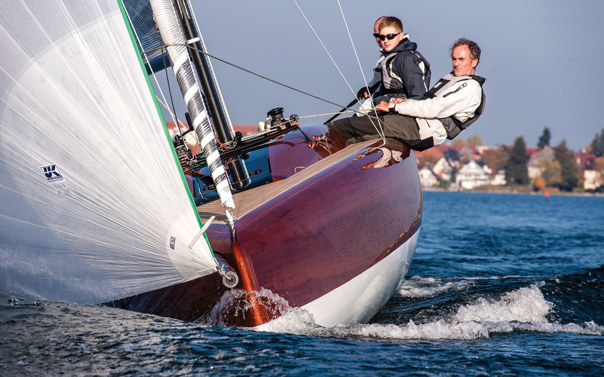 small wooden boat sail