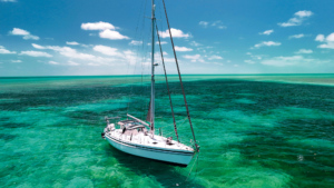 Yacht moored in green water