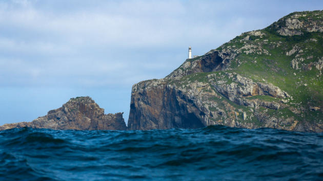 Cabo Frio Lighthouse ‘Focino do Cabo’ on a calm, sunny day.