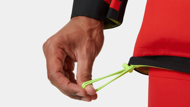 The jacket has handy adjustable elastic to stop water from creeping up inside.