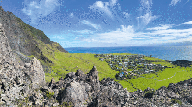 A steep climb up a basalt hill rewards the author with a panoramic view of the Tristan da Cunha settlement Edinburgh of the Seven Seas.