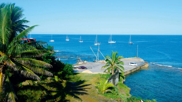 Yachts moored near Sir Robert’s Wharf at Alofi – Niue’s main cargo supplies quay.