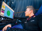 Will Harris at the nav station of the IMOCA Malizia in the 2023 iteration of The Ocean Race.