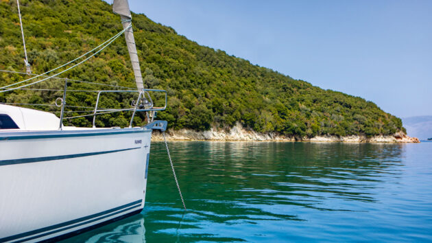 Sailing yacht anchored in the sun