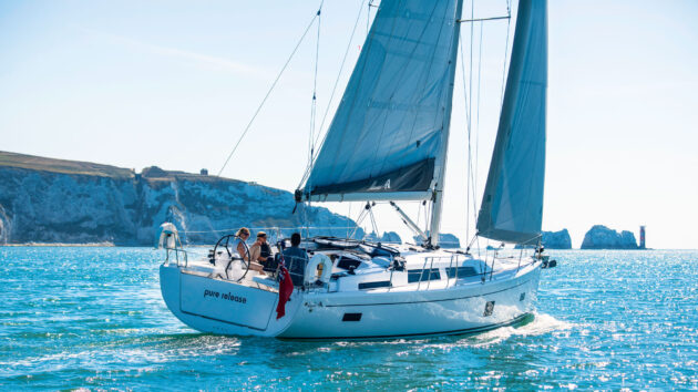 A yacht sailing in the sun