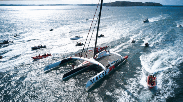 The trimaran motoring in the water