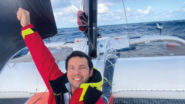 Soudée celebrates as he crossed the virtual line off Ushant on 28 March, smashing the 100-day barrier for a solo westabout around the world