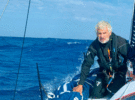 Man staring out to sea on a yacht