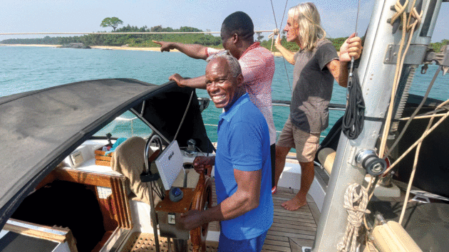 Three people on the yacht