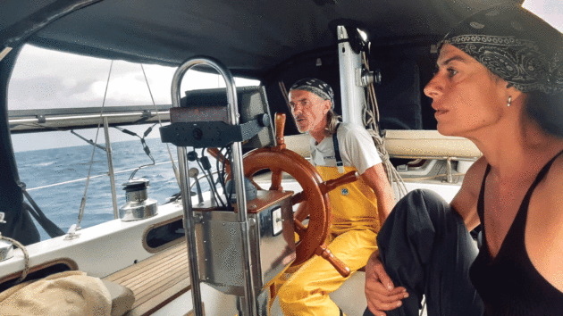 Robert D and Elena at Rebels’ classically styled helm while underway