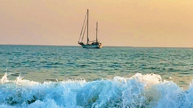Anchored beyond the breaking surf 