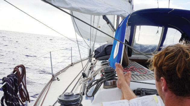 Someone with their feet up on a yacht