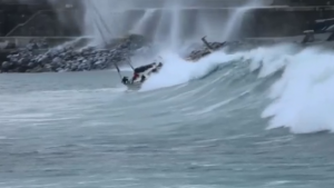 Boat rolled by wave