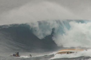 Boat flipped by wave