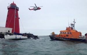 Yacht washed onto rocks off Ireland