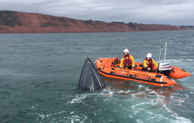 Sinking motorboat off Exmouth