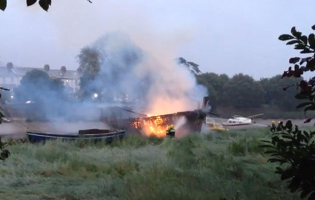 Boat fire on the River Taw in Devon