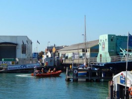 RNLI rescue boat pinned against Poole bridge