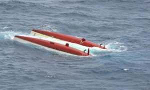 capsized catamaran