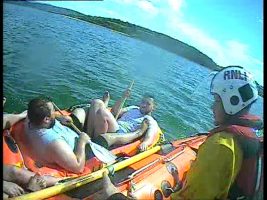 Some of the men in their makeshift raft off Anglesey