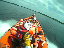 9 people rescued after boat runs aground in The RNLI is warning all skippers to study charts and stay within navigational channels after the cruiser grounded on rocks at Lough Derg in Ireland.