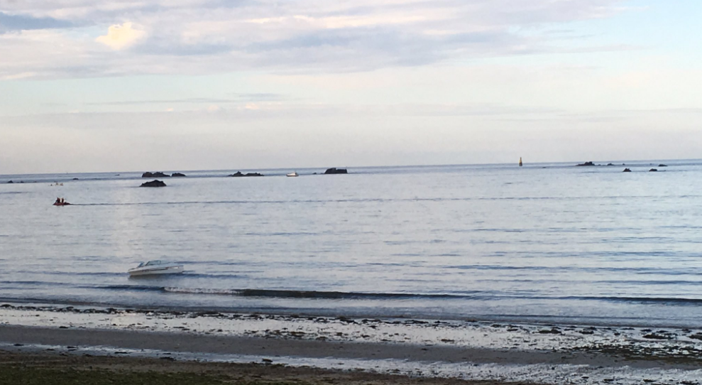 The submerged boat and car at Greve D`Azette Slipway, Jersey