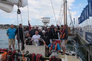 Crew and guests on a Clipper 68 out of Cowes