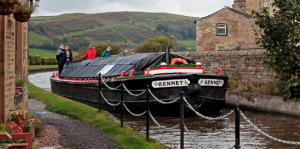 The historic Kennet short boat on a canal