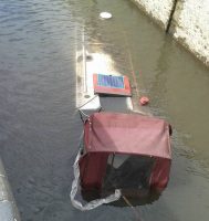 Sunken canal boat at Fobney Lock, Kennet and Avon Canal