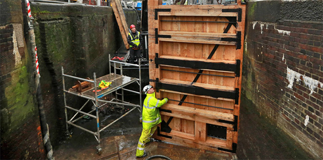 Fixing lock gates part of winter repairs on canals.