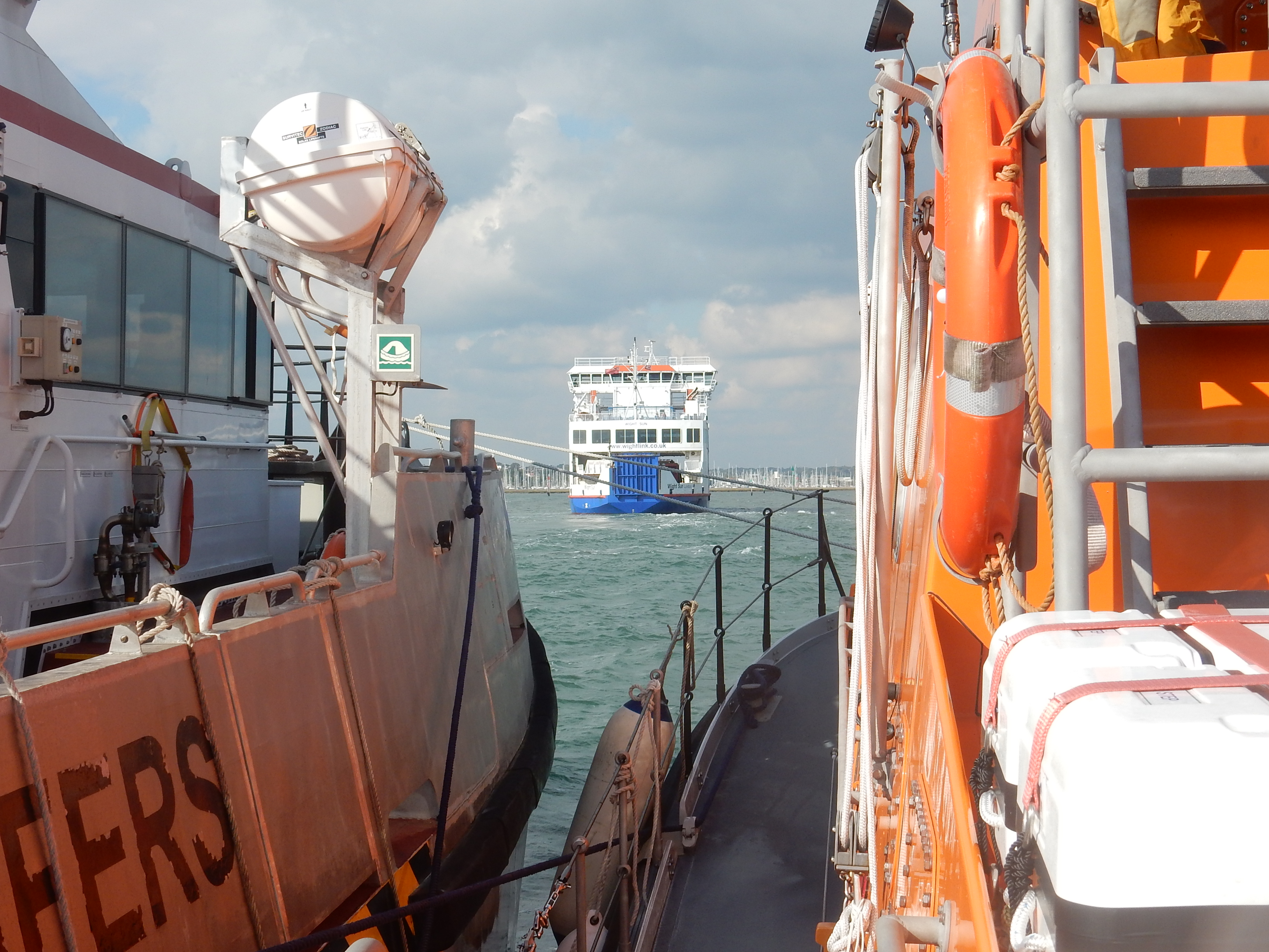 RNLI Yarmouth assist large trimaran in Lymington