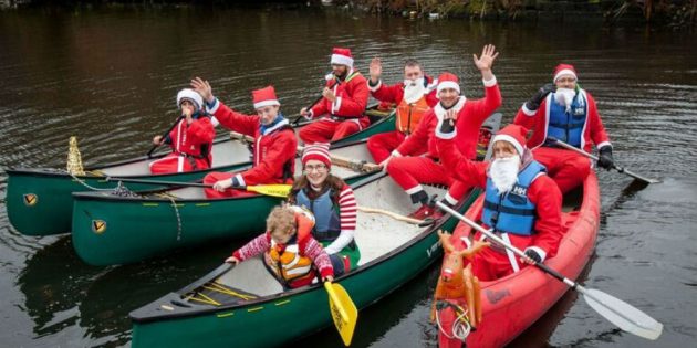 Canoeists taking part in Santa Splash