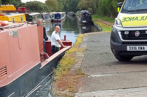 Paramedics use a narrowboat to transport casualty at Boggs Lock